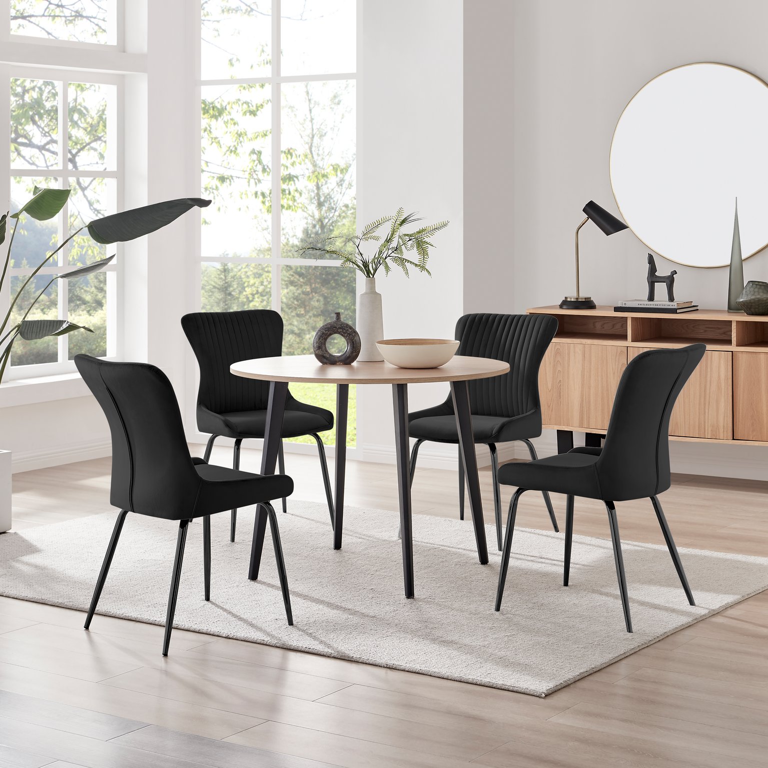 Koko 100cm Round Dining Table & 4 Nora Velvet Dining Chairs Black Leg