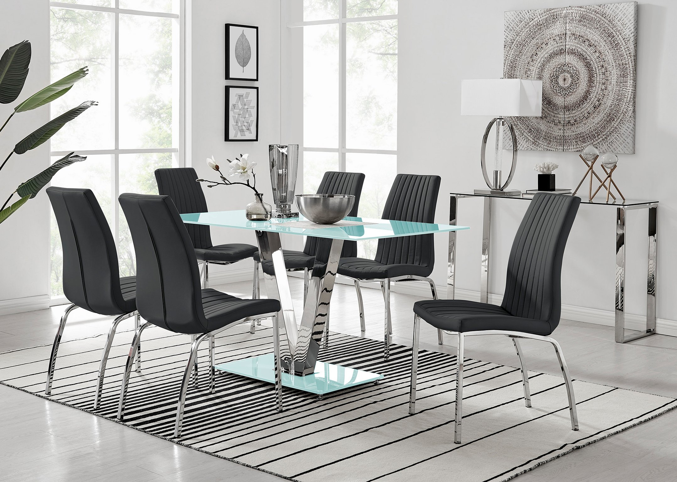 glass dining table with 6 white leather chairs