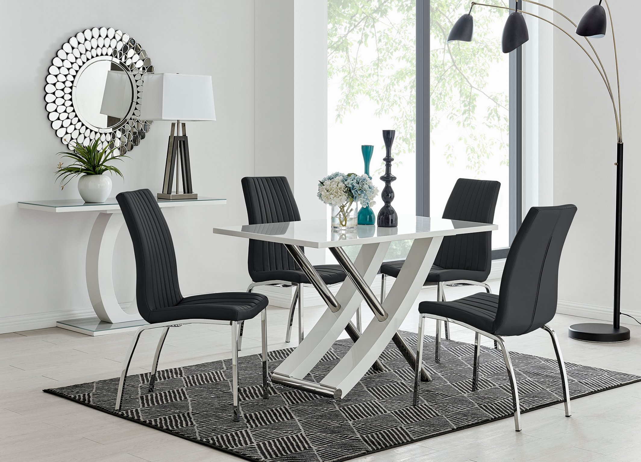 4 black and chrome dining chairs