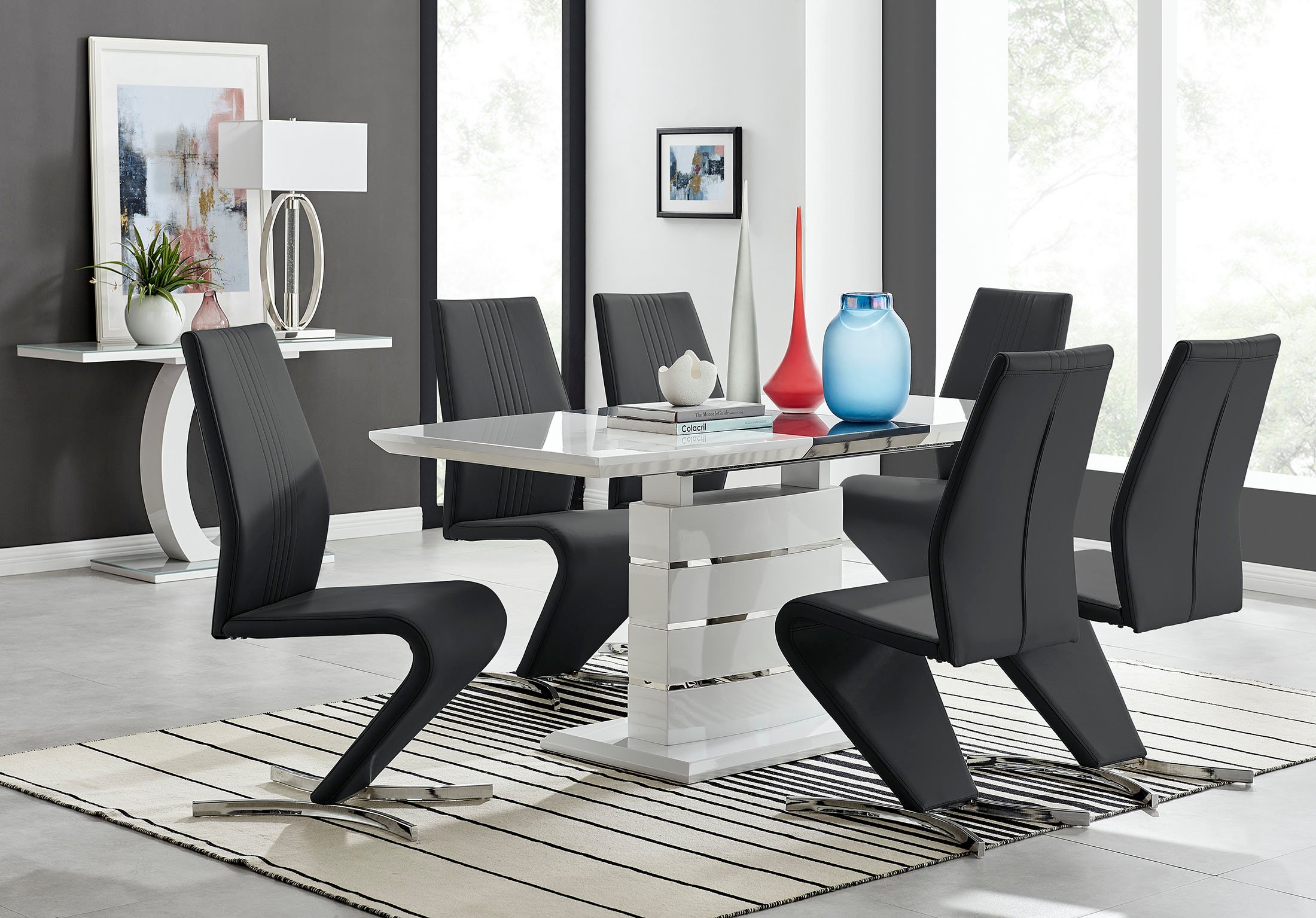 white gloss dining table and black chairs