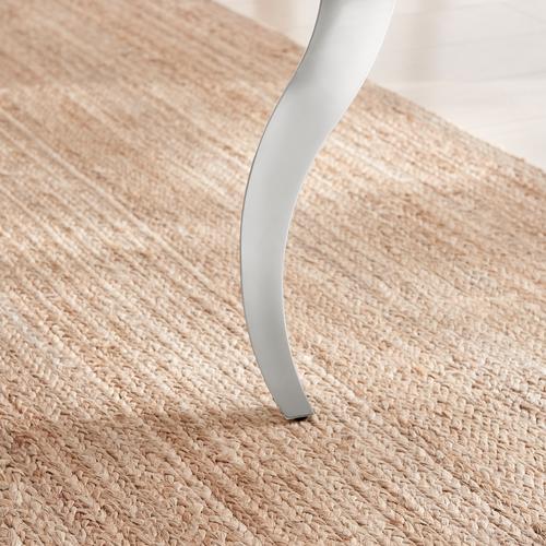 Sculptural Curved Leg Design