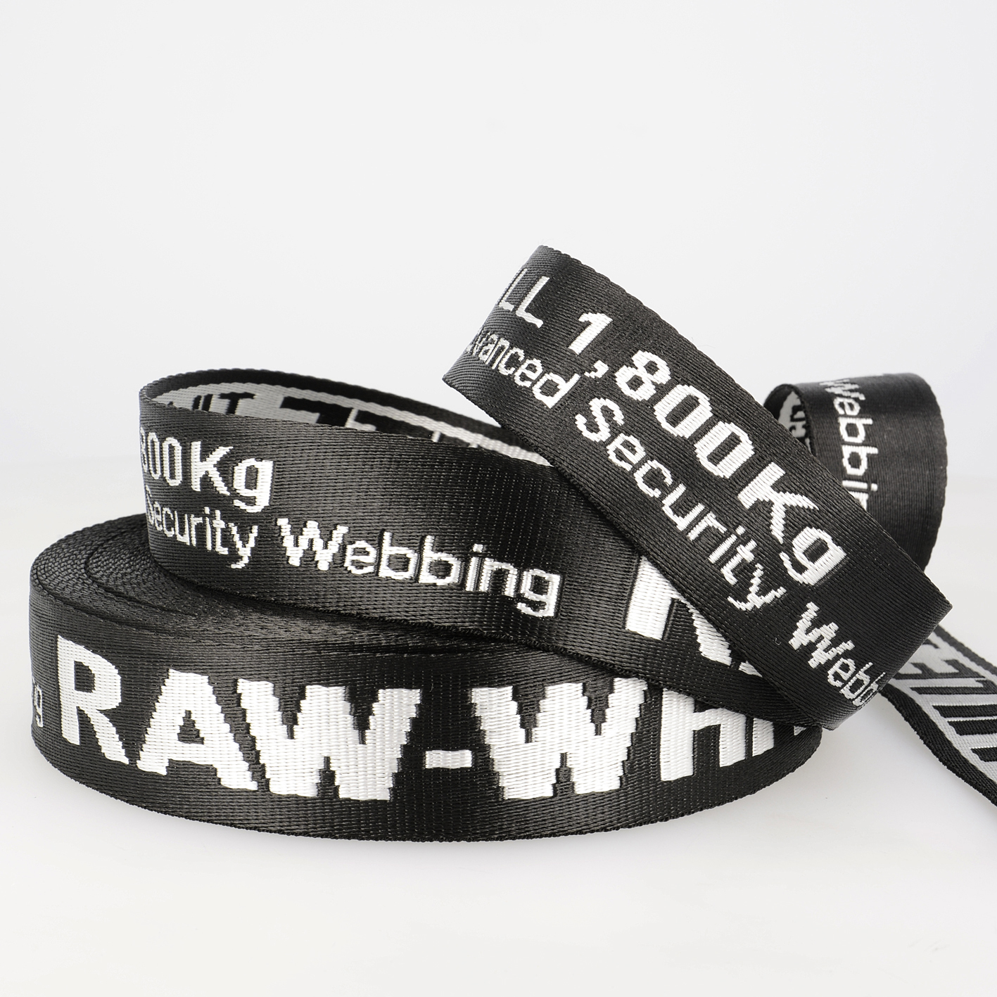 Trim bing Jacquard 'Security Strap' 20m x 35mm White on Black